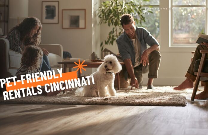 pet-friendly housing cincinnati A family in Cincinnati in their living with their beautiful poodle
